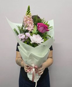 Pretty Seasonal Flower Wrap Holding